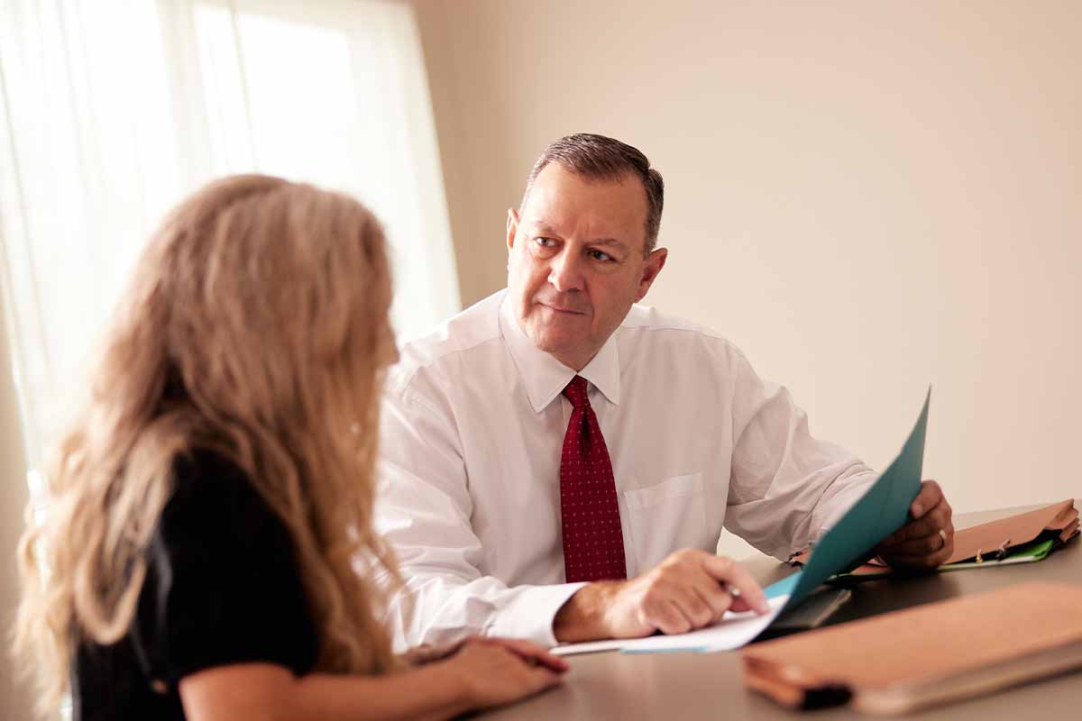 Mr. Guajardo, auto accident lawyer in Austin meeting with a client