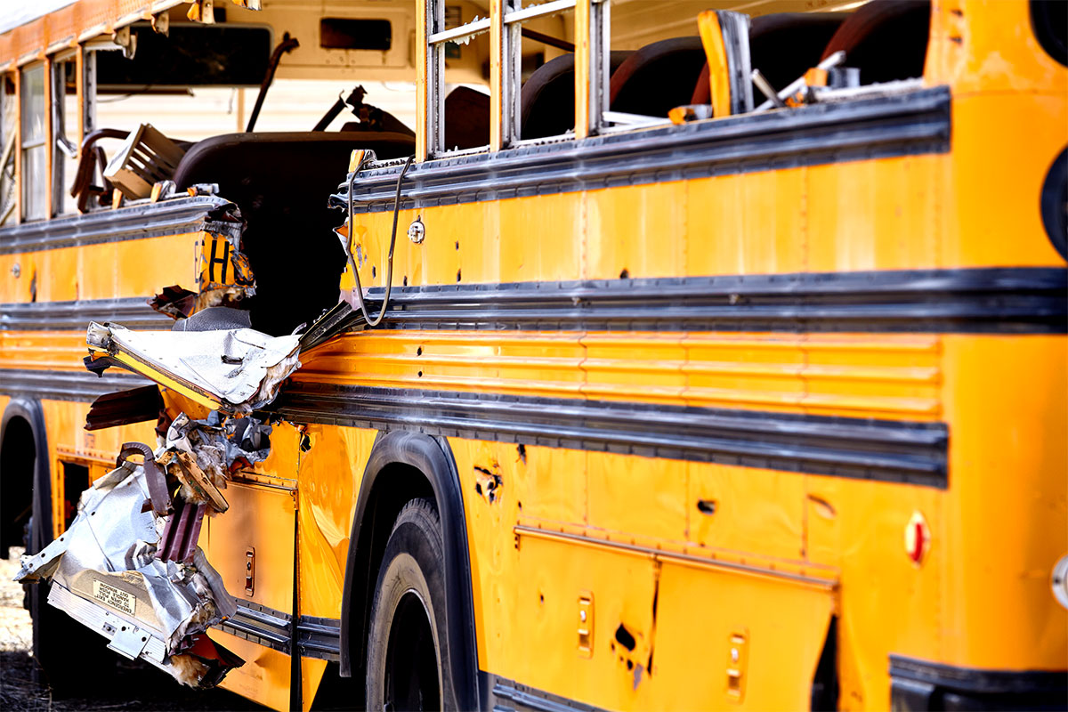 a bus torn open on the side, requiring the help of a bus accident lawyer in Austin